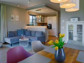 Reetland am Meer - Premium Reetdachvilla mit 3 Schlafzimmern, Sauna und Kamin F27, Dranske